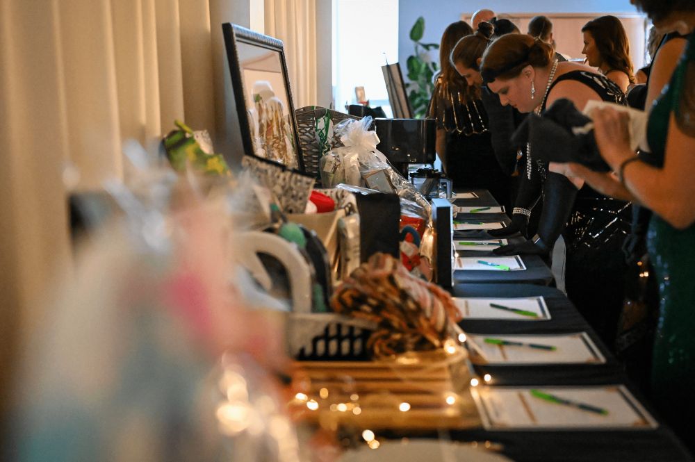 Silent auction tables at the gala