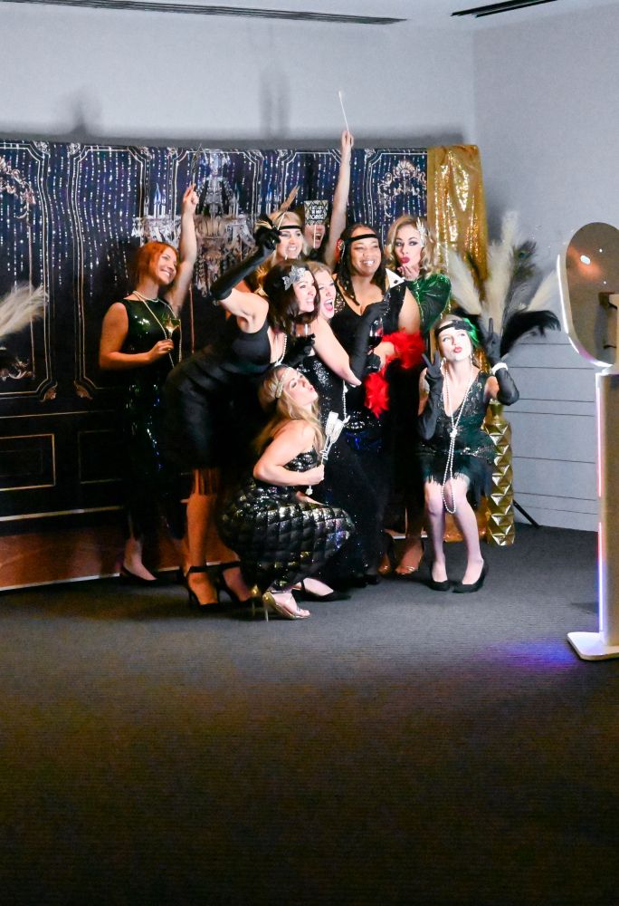 Guests at the FACF gala photo wall
